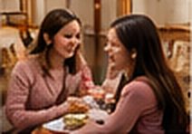 Mother and daughter at the table